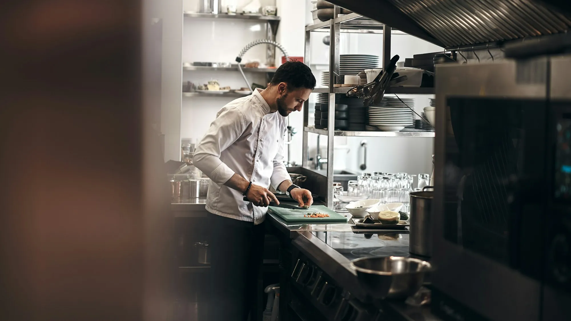 Commercial water filtration in Aliso Viejo Chef preparing food in a restaurant kitchen